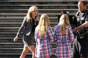 Reese Witherspoon, gray suit, high heels, black blouse, This Means War film set